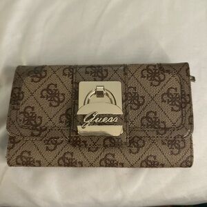 Guess Tan and Brown Monogram Clutch